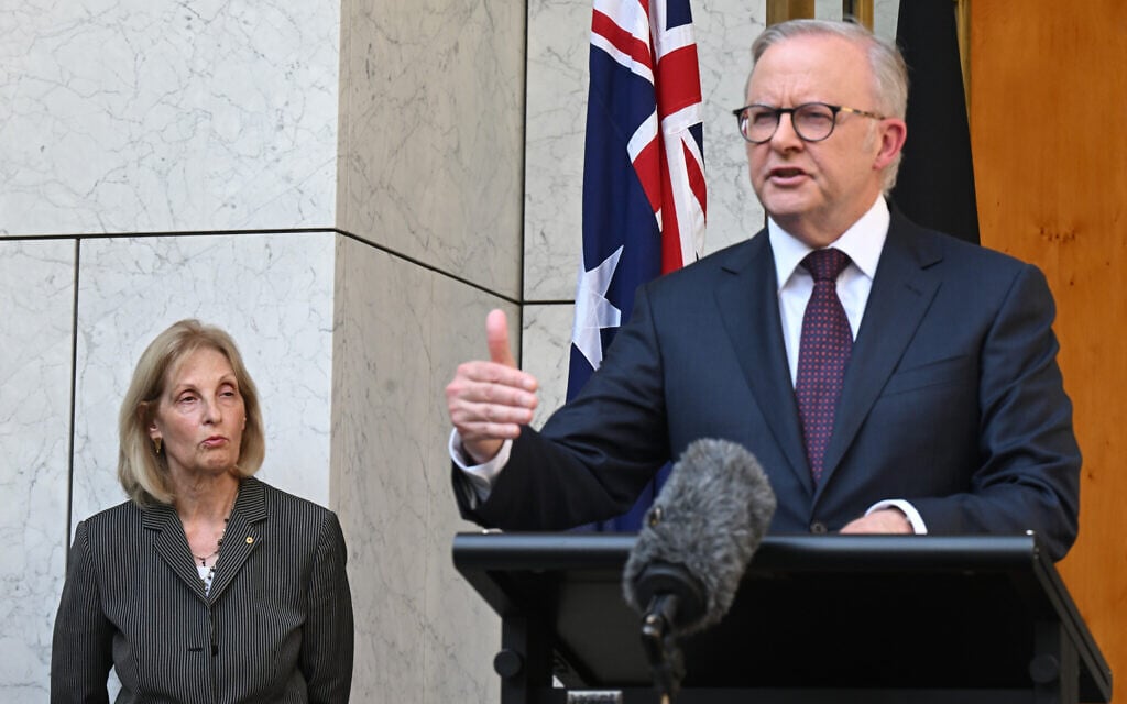 Jillian Siegel, Special Envoy to Combat Antisemitism in Australia, listens to Prime Minister Anthony Albanese speak to the media during a press conference at Parliament House in Canberra, Australia, January 8, 2026. (Lukas Coch/AAP Image via AP)