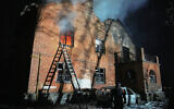 A residential building burns after a Russian strike in Kyiv, Ukraine, January 9, 2026. (AP Photo/Efrem Lukatsky)