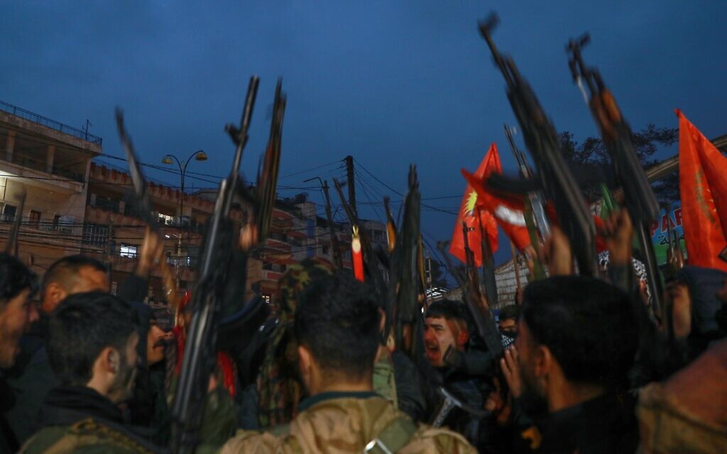Kurdish fighters gather in Aleppo,  Syria, January 9, 2026. (AP Photo/Hogir Al Abdo)