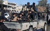 Syrian security forces in the Sheikh Maqsoud neighborhood in Aleppo, Syria, January 10, 2026. (AP Photo/Ghaith Alsayed)