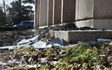 Burnt debris from a fire at the Beth Israel Congregation glints in the sun on January 12, 2026, in Jackson, Mississippi. (AP/Sophie Bates)