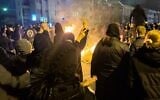 In this photo obtained by The Associated Press, Iranians attend an anti-government protest in Tehran, Iran, January 9, 2026. (UGC via AP)