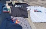 This photo provided by US Attorney's Office shows clothing displaying antisemitic, anti-Israel, and extremist symbols that were found in former Navy SEAL Seal  Gregory Vandenberg vehicle by authorities.  (US Attorney's Office via AP)
