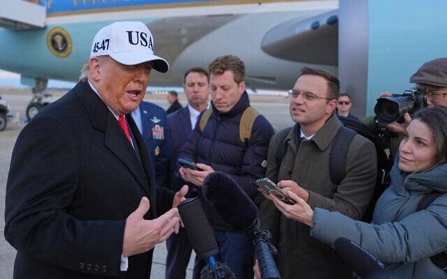 US President Donald Trump speaks with reporters on January 13, 2026, in Joint Base Andrews, Maryland. (AP/Evan Vucci) US President Donald Trump speaks with reporters on January 13, 2026, in Joint Base Andrews, Maryland. (AP/Evan Vucci)