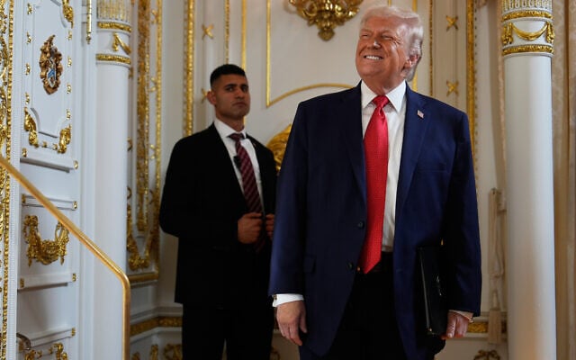 US President Donald Trump arrives at a dedication ceremony for a portion of Southern Boulevard, which the Town of Palm Beach Council recently voted to rename 'President Donald J. Trump Boulevard,' January 16, 2026, at his Mar-a-Lago Club in Palm Beach, Florida. (AP Photo/Julia Demaree Nikhinson)