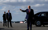 President Donald Trump points after arriving at Palm Beach International Airport on Air Force One, Friday, Jan. 16, 2026, in West Palm Beach, Fla. (AP Photo/Julia Demaree Nikhinson)