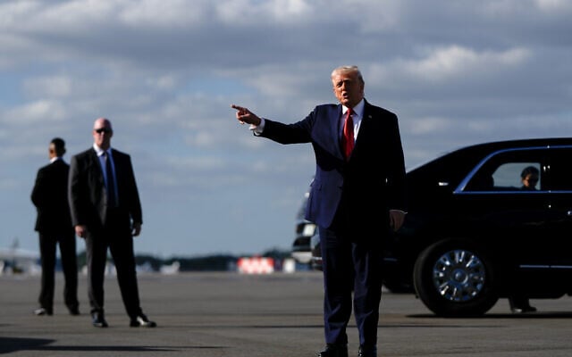 President Donald Trump points after arriving at Palm Beach International Airport on Air Force One, Friday, Jan. 16, 2026, in West Palm Beach, Fla. (AP Photo/Julia Demaree Nikhinson) President Donald Trump points after arriving at Palm Beach International Airport on Air Force One, Friday, Jan. 16, 2026, in West Palm Beach, Fla. (AP Photo/Julia Demaree Nikhinson)