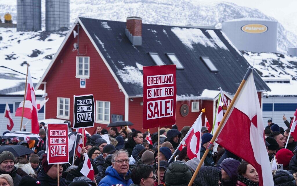 People protest against US President Donald Trump's threats to take over Greenland in front of the US consulate in Nuuk, Greenland, January 17, 2026. (AP/Evgeniy Maloletka)