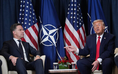 US President Donald Trump, right, meets with NATO Secretary General Mark Rutte during a meeting on the sidelines of the Annual Meeting of the World Economic Forum in Davos, Switzerland, January 21, 2026. (AP/Evan Vucci)