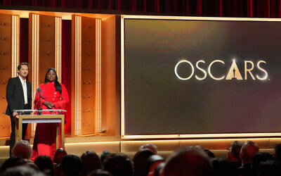 Lewis Pullman, left, and Danielle Brooks present the nominees for the 98th Academy Awards on Thursday, Jan. 22, 2026, at the Samuel Goldwyn Theater in Beverly Hills, Calif. (Photo by Jordan Strauss/Invision/AP)