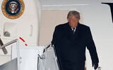 US President Donald Trump arrives on Air Force One at Joint Base Andrews, Maryland, January 22, 2026, after returning from the World Economic Forum in Davos.(Luis M. Alvarez/AP)