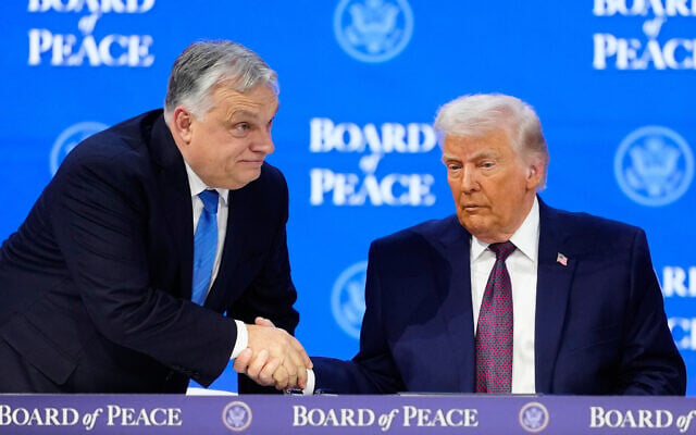 US President Donald Trump shakes hands with Prime Minister of Hungary Viktor Orban, left, during a signing ceremony on the US-led Board of Peace at the Annual Meeting of the World Economic Forum in Davos, Switzerland, January 22, 2026. (AP Photo/Markus Schreiber) US President Donald Trump shakes hands with Prime Minister of Hungary Viktor Orban, left, during a signing ceremony on the US-led Board of Peace at the Annual Meeting of the World Economic Forum in Davos, Switzerland, January 22, 2026. (AP Photo/Markus Schreiber)