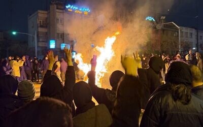 In this photo obtained by The Associated Press, Iranians attend an anti-government protest in Tehran, Iran, January 9, 2026. (UGC via AP)
