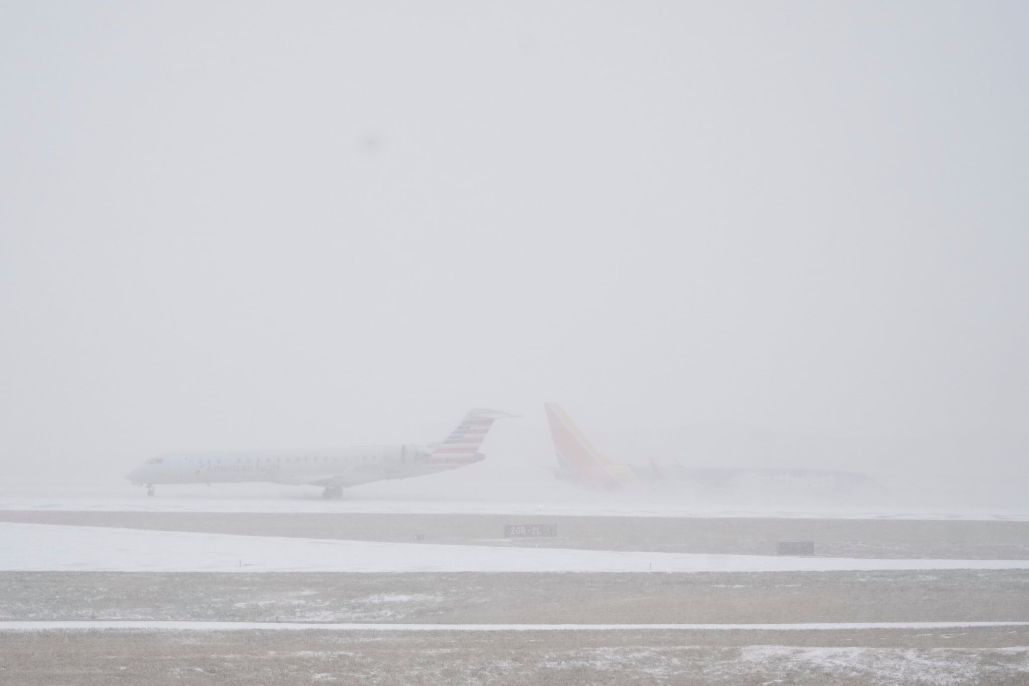 Brutal US travel day as more than 13,500 flights canceled amid massive winter storm
