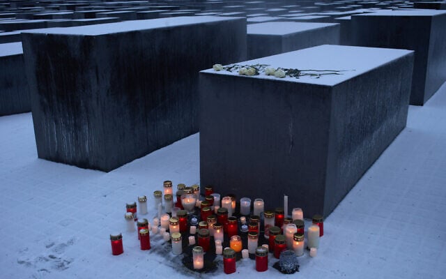 Candles placed in front of a concrete slab of the Holocaust memorial to mark International Holocaust Memorial Day in Berlin, Germany, January 27, 2026. (Markus Schreiber/AP) Candles placed in front of a concrete slab of the Holocaust memorial to mark International Holocaust Memorial Day in Berlin, Germany, January 27, 2026. (Markus Schreiber/AP)