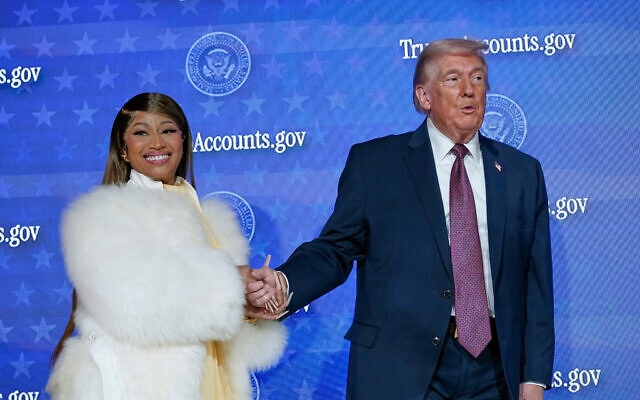 Nicki Minaj and US President Donald Trump stand on stage during the launch of a program known as Trump Accounts at the Andrew W. Mellon Auditorium, January 28, 2026, in Washington. (AP Photo/Jose Luis Magana) Nicki Minaj and US President Donald Trump stand on stage during the launch of a program known as Trump Accounts at the Andrew W. Mellon Auditorium, January 28, 2026, in Washington. (AP Photo/Jose Luis Magana)