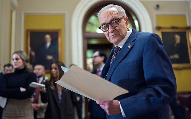 Senate Minority Leader Chuck Schumer waits to speak to reporters following a closed-door meeting with fellow Democrats on spending legislation that funds the Department of Homeland Security and a swath of other government agencies at the Capitol in Washington, Jan. 28, 2026. (AP Photo/J. Scott Applewhite) Senate Minority Leader Chuck Schumer waits to speak to reporters following a closed-door meeting with fellow Democrats on spending legislation that funds the Department of Homeland Security and a swath of other government agencies at the Capitol in Washington, Jan. 28, 2026. (AP Photo/J. Scott Applewhite)
