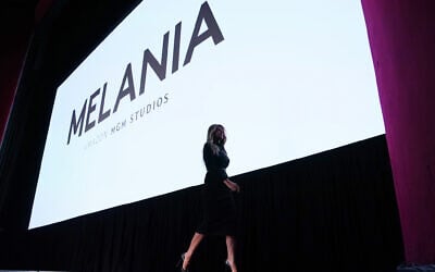 US first lady Melania Trump walks from the stage after speaking before the premiere of her movie "Melania" at The John F. Kennedy Memorial Center For The Performing Arts, January 29, 2026. (AP Photo/Allison Robbert)