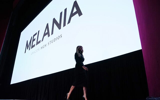 US first lady Melania Trump walks from the stage after speaking before the premiere of her movie "Melania" at The John F. Kennedy Memorial Center For The Performing Arts, January 29, 2026. (AP Photo/Allison Robbert)