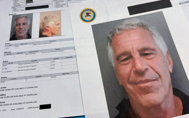 Documents included in the US Justice Department release of files related to disgraced financier and sex offender Jeffrey Epstein are photographed on January 2, 2026. (AP Photo/Jon Elswick) Documents included in the US Justice Department release of files related to disgraced financier and sex offender Jeffrey Epstein are photographed on January 2, 2026. (AP Photo/Jon Elswick)