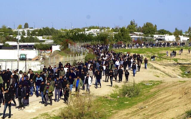 Mourners partake in a funeral procession for Muhammad Hussein Tarabin, a Bedouin man who was killed by police gunfire, before he is laid to rest in Tarabin al-Sana on January 5, 2026. (Charlie Summers/Times of Israel) Mourners partake in a funeral procession for Muhammad Hussein Tarabin, a Bedouin man who was killed by police gunfire, before he is laid to rest in Tarabin al-Sana on January 5, 2026. (Charlie Summers/Times of Israel)