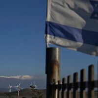 View of the first snow this winter on Mount Hermon in Syria, as seen from the northern Golan Heights near the Syrian border, on December 13, 2025. (Michael Giladi/Flash90)