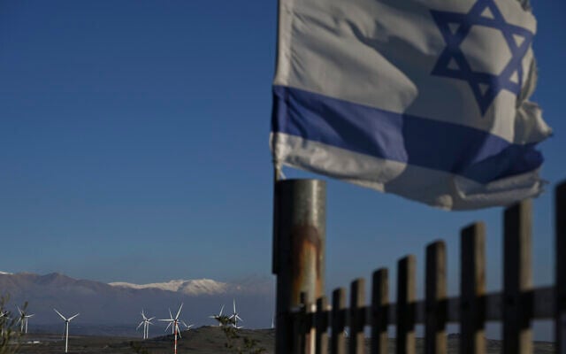 View of snow on Mount Hermon in Syria, as seen from the northern Golan Heights near the Syrian border, December 13, 2025.  (Michael Giladi/Flash90)