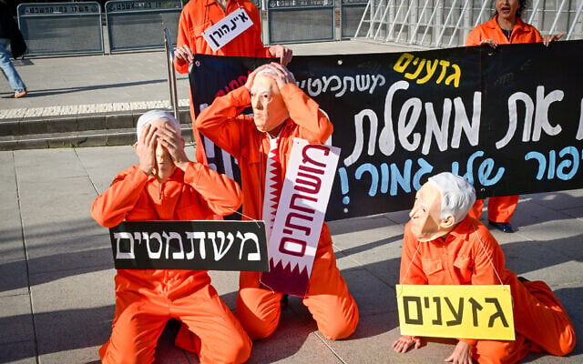 Activists protest against Prime Minister Benjamin Netanyahu outside the District Court in Tel Aviv, where he was supposed to testify in his trial, December 23, 2025. (Avshalom Sassoni/Flash90) Activists protest against Prime Minister Benjamin Netanyahu outside the District Court in Tel Aviv, where he was supposed to testify in his trial, December 23, 2025. (Avshalom Sassoni/Flash90)