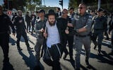 Ultra-Orthodox Jews protest against Haredi conscription outside the IDF Recruitment Center at Tel Hashomer, January 4, 2026. (Erik Marmor/Flash90)