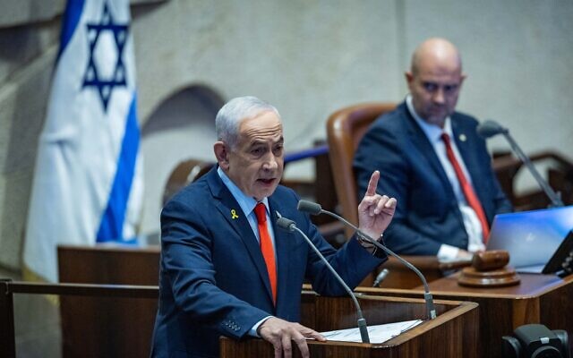 Prime Minister Benjamin Netanyahu speaks at a 40-signature debate at the Knesset in Jerusalem, January 5, 2026. (Yonatan Sindel/Flash90)
