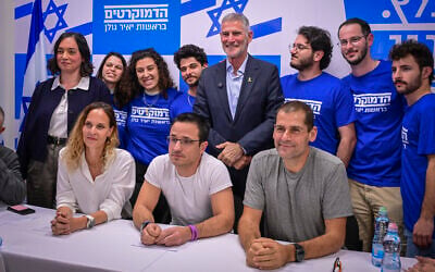 The Democrats chairman Yair Golan (center, standing) holds a press conference in Tel Aviv to present the party’s new members, January 6, 2026. (Avshalom Sassoni/Flash90)