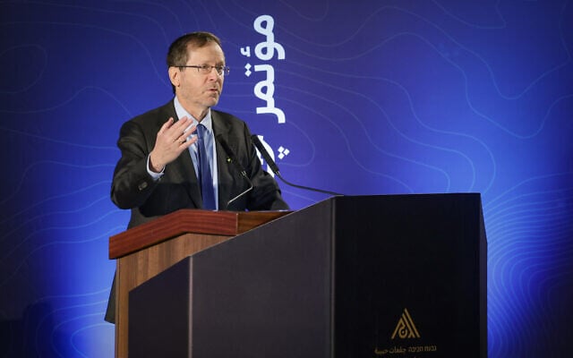 President Isaac Herzog speaks during a conference at Givat Haviva, January 6, 2026. (Tal Gal/Flash90)