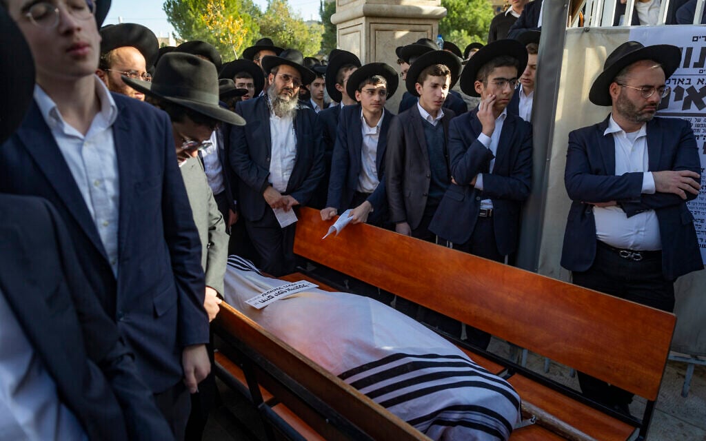 The funeral of 14-year-old Yosef Eisenthal, who was killed after being hit by a bus during an ultra-Orthodox protest in Jerusalem, January 7, 2026. (Chaim Goldberg/Flash90)