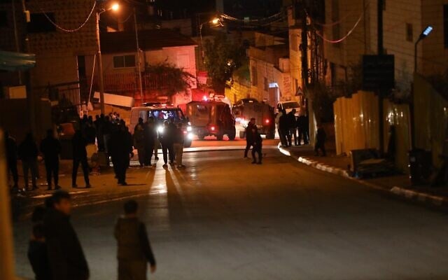 Israeli security forces near the site of a suspected car ramming attack in the West Bank city of Hebron, January 10, 2026. (Wisam Hashlamoun/Flash90) Israeli security forces near the site of a suspected car ramming attack in the West Bank city of Hebron, January 10, 2026. (Wisam Hashlamoun/Flash90)