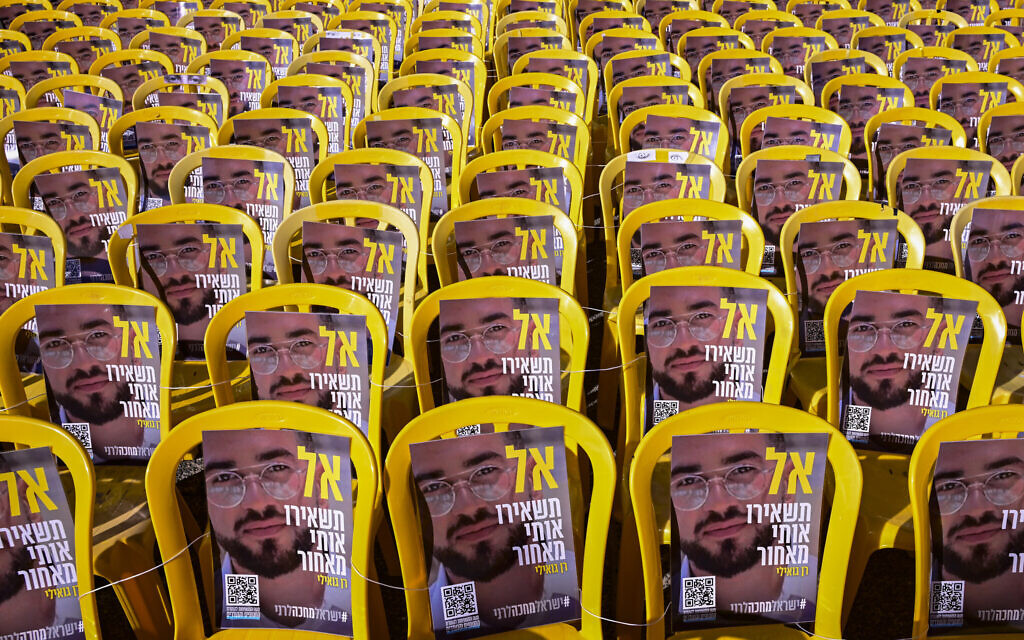 Posters bearing the image of final hostage Ran Gvili are displayed on chairs at Hostages Square in Tel Aviv, January 16, 2026. (Avshalom Sassoni/Flash90)