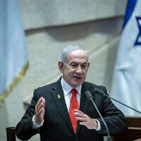 Prime Minister Benjamin Netanyahu addresses the Knesset plenum in Jerusalem, January 19, 2026. (Chaim Goldberg/Flash90)