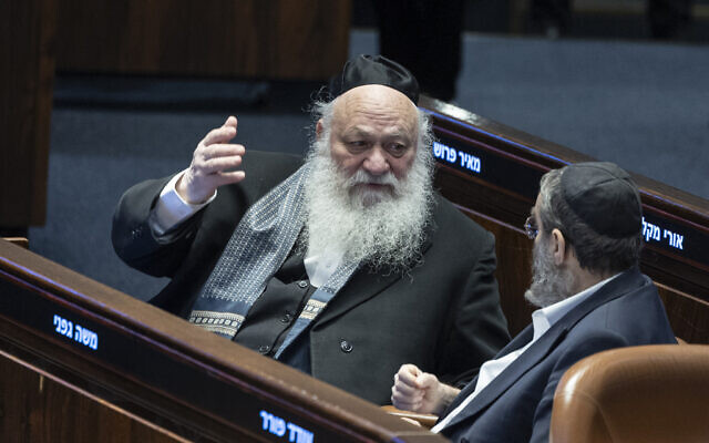 MKs Moshe Gafni and Yitzchak Goldknopf seen during a vote on the state budget at the Knesset, January 28, 2026. (Oren Ben Hakoon/Flash90)
