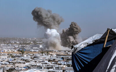 Smoke rises following an Israeli airstrike west of Khan Younis in the southern Gaza Strip, January 31, 2026. (Abed Rahim Khatib/Flash90) Smoke rises following an Israeli airstrike west of Khan Younis in the southern Gaza Strip, January 31, 2026. (Abed Rahim Khatib/Flash90)