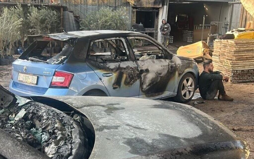 Cars torched a in a settler attack on the northern West Bank village of Deir Sharaf on January 8, 2026. (Courtesy)