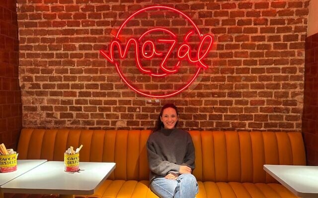 Tamara Cohen has sold challah along with bagels every week since she opened Mazál. (Shira Li Bartov/ JTA)