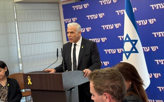 Opposition Leader Yair Lapid speaks at a Yesh Atid faction meeting in the Knesset on January 5, 2026. (Sam Sokol/Times of Israel)