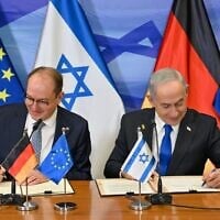Prime Minister Benjamin Netanyahu (right) and visiting German Interior Minister Alexander Dobrindt sign a joint declaration in Jerusalem, January 11, 2026. (Kobi Gideon/GPO)