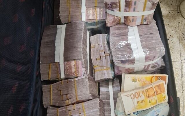 A bag of cash being smuggled through the Allenby border crossing in a picture released on January 18, 2026. (Israel Police)