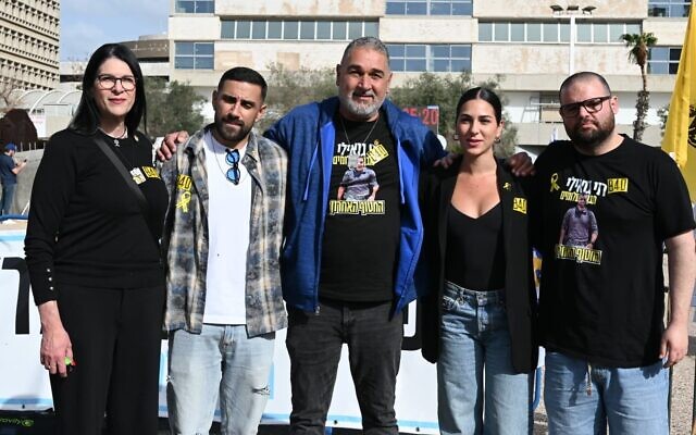 From left: Talik Gvili, Segev Kalfon, Itzik Gvili, Shira Gvili and Eitan Horn, at Hostages Square in Tel Aviv on January 23, 2026. (Jessica Steinberg/Times of Israel)