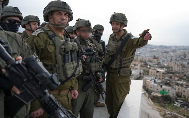 IDF Chief of Staff Lt. Gen. Eyal Zamir (left) meets with officers in the West Bank city of Hebron, January 21, 2026. (Israel Defense Forces) IDF Chief of Staff Lt. Gen. Eyal Zamir (left) meets with officers in the West Bank city of Hebron, January 21, 2026. (Israel Defense Forces)