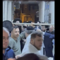 Haredi protesters clash with attendees at a conference for the ultra-Orthodox Hasmonean Brigade in Bnei Brak on January 11, 2026. (Screenshot/social media, used in accordance with clause 27a of the copyright law)