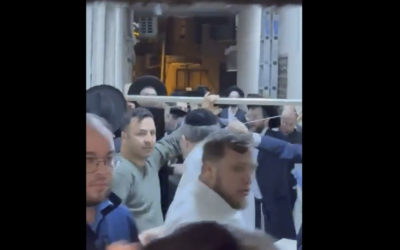 Haredi protesters clash with attendees at a conference for the ultra-Orthodox Hasmonean Brigade in Bnei Brak on January 11, 2026. (Screenshot/social media, used in accordance with clause 27a of the copyright law)