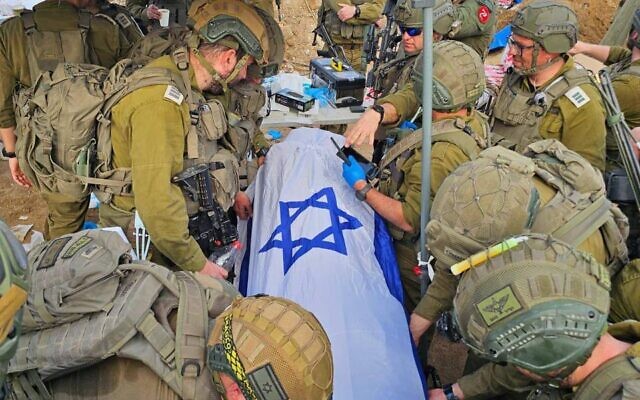 The body of Master Sgt. Ran Gvili after being located by Israeli troops at a cemetery in eastern Gaza City, January 26. 2026. (Courtesy)