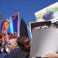 Protesters decry the police's handling of crime in the Arab sector during a demonstration outside the Prime Minister's Office in Jerusalem on January 11, 2026. (Times of Israel)