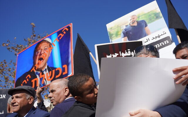Protesters decry the police's handling of crime in the Arab sector during a demonstration outside the Prime Minister's Office in Jerusalem on January 11, 2026. (Times of Israel)
